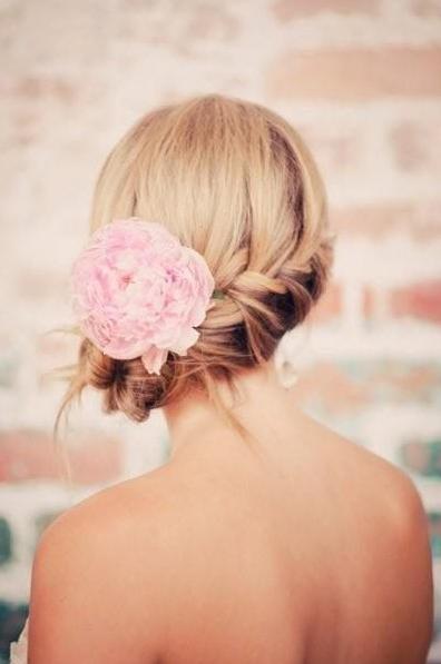 Braided updo with flower