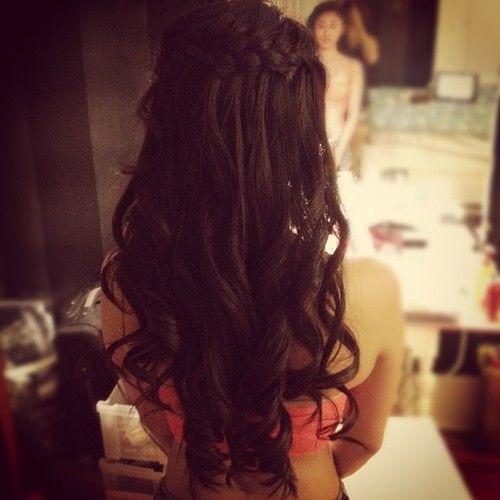 dark brunette curls with a braid